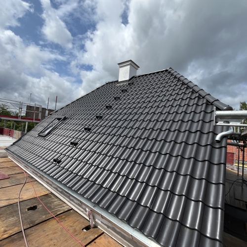 Tagarbejde i Hellerup, nær Lyngby